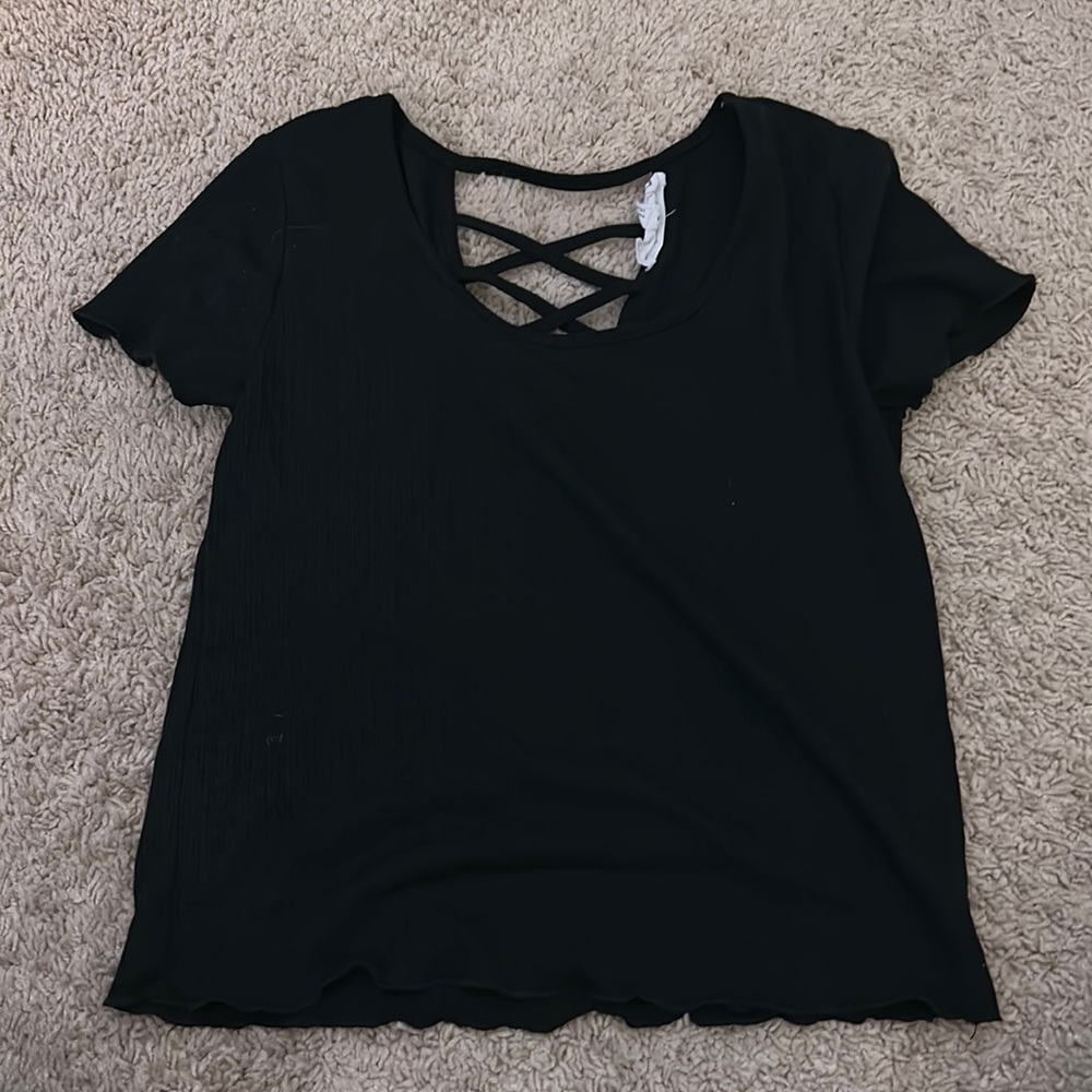 Black womens shirt. Straps on back.